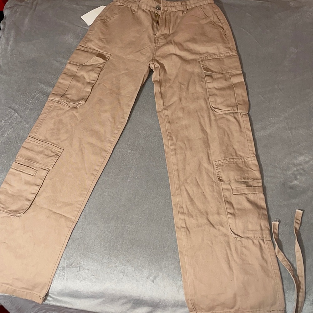Cargo Pants with adjustable ankle widths. Size Small, Tan color. Brand New!!